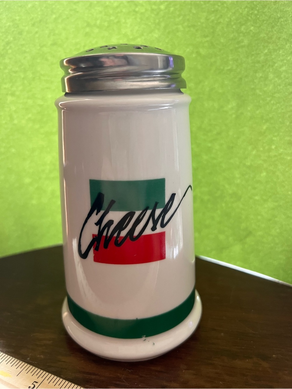 White Ceramic 'Cheese'  Shaker with Green & Red Accent